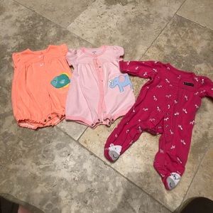 Bundle of two rompers and a footie. Size 6 months